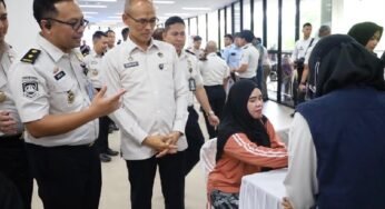 Gelar Layanan Kesehatan Gratis dan Baksos di Sebatik, Kanwil Ditjen Imigrasi Kaltim Serahkan Ratusan Paket Sembako